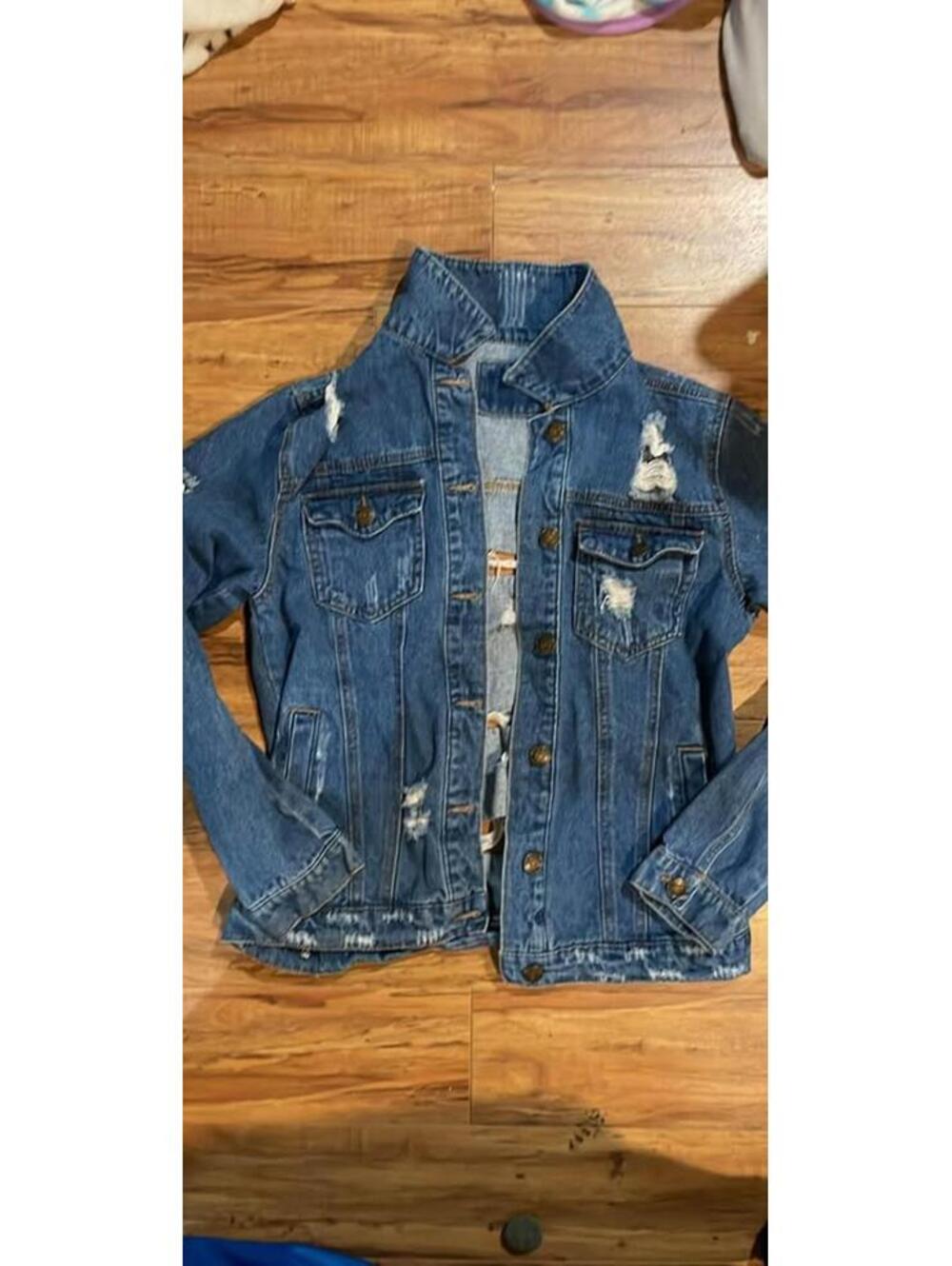 Distressed Blue Denim Jacket with Ripped Detailing